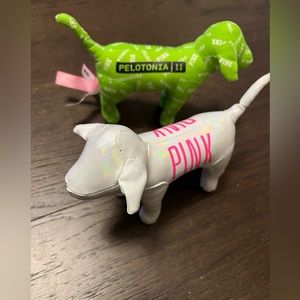 2 VS pink dogs. One is the rare "Pelotonia 11" green dog and silver shimmer dog.